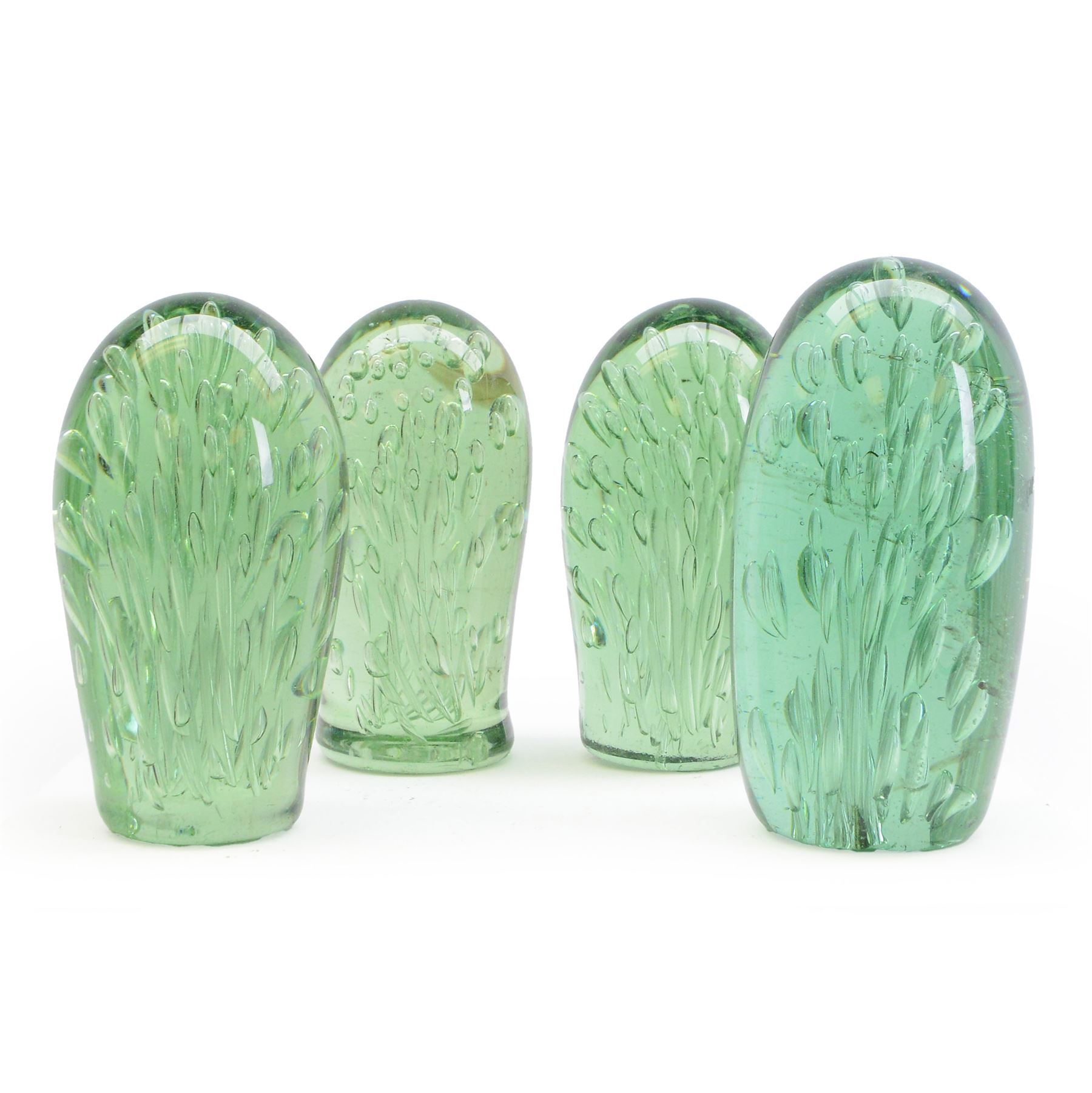 Four Victorian green glass dump paperweight with air bubble inclusions, H16cm