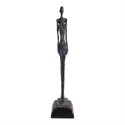 After Alberto Giacometti - Femme Venise bronze upon a stepped marble base, overall H50cm