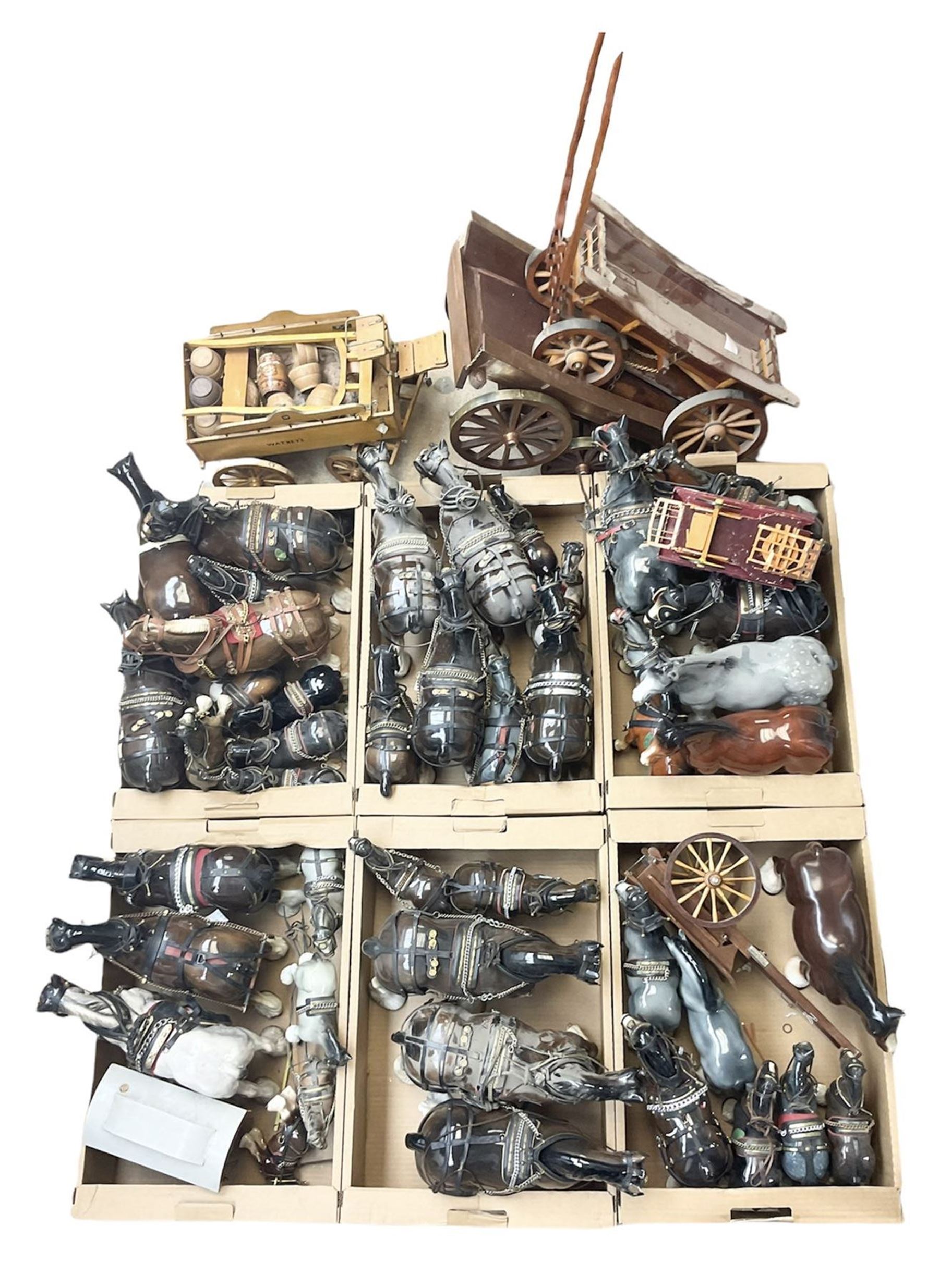 Approximately forty seven ceramic Shire horses to include Sylvac and Melba Ware examples of various sizes and colours, many with harnesses, and a quantity of carts and wagons 