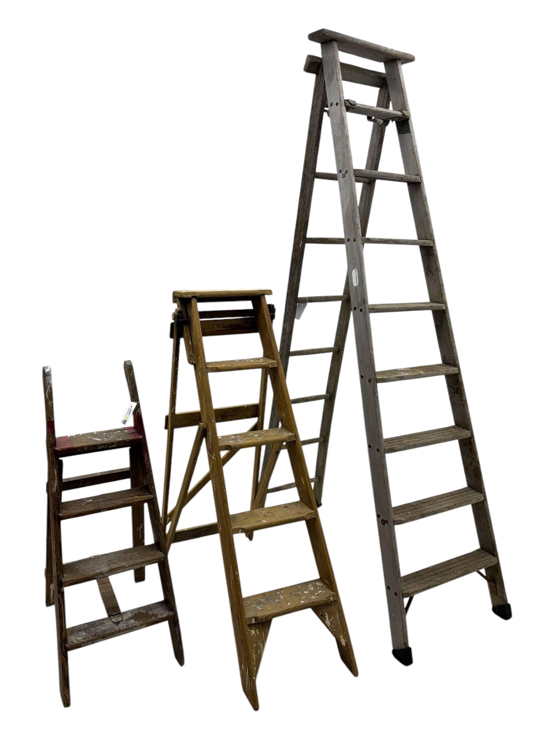 Slingsby - large pair of wooden ladders; G A Jones's - wooden steps; and a small wooden step ladder (3)