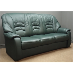  Four piece lounge suite three seat sofa (W202cm, H106cm, D90cm) pair of matching armchairs, (W95cm, H106cm, D87cm), and a footstool (W40cm, H46cm, D40cm), upholstered in green leather  