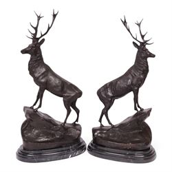 After Jules Moigniez (French 1835-1894): Pair of bronze stag figures on marble bases, each...