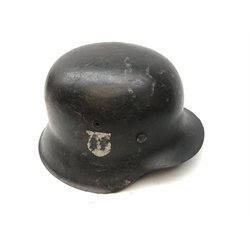  WW2 Waffen SS steel helmet, grey paint finish with single SS decal to side, interior stamped 2066 ?E?? with leather liner and chinstrap,   