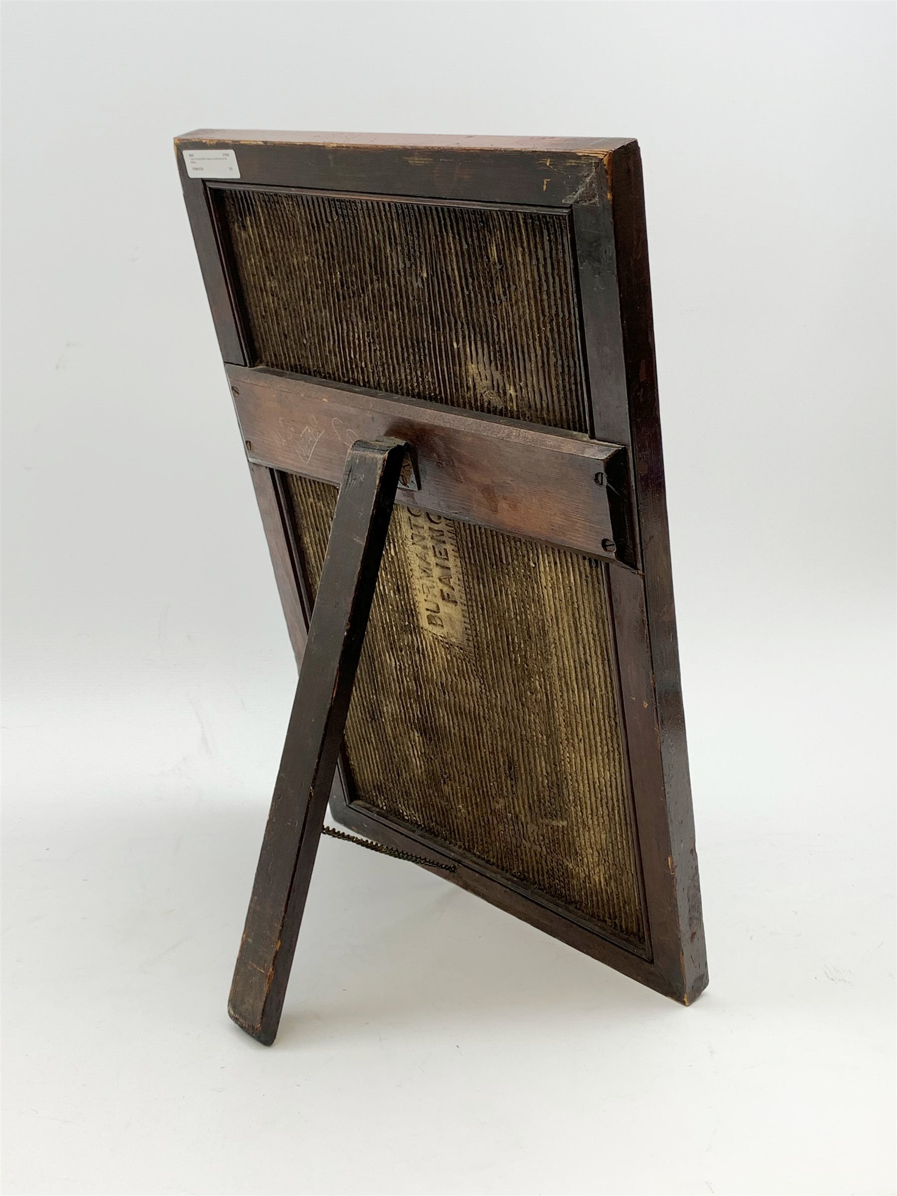 20th century large Burmantofts Faience architectural tile plaque, The Maide at The Inn, designed by William Neatby, of rectangular form depicting a female figure holding a tray, with cat seated at her feet, titled lower left corner, within mahogany frame with easel style support verso, plaque 48.5cm x 29cm

Born in 1860 in Barnsley, Yorkshire, William James Neatby worked at Burmantofts Pottery  designing ceramic tiles for six years. He then went on to work at Doulton & Co, and in 1902 designed the tiles for the interior of Harrods Meat Hall. 