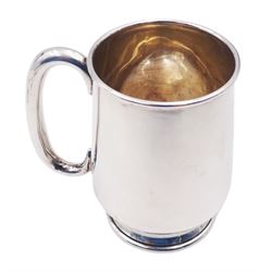 Small 1930's christening mug, of slightly tapering plain form, with C handle, upon circular spreading foot, hallmarked Barker Brothers Silver Ltd, Birmingham 1936, together with a set of twelve Dutch silver coffee spoons, with twist handles, impressed with GZ for Johannes Albertus Adolf Gerritsen and sword mark to bowls and five other silver spoons, each with varying designs and hallmarks, approximate total weight 7.42 ozt (230.5 grams)