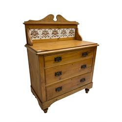 Victorian pine wash chest, raised pediement over tiled back, fitted with three long drawers, on turned feet