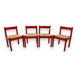 Vico Magistretti - mid-20th century circa. 1970s set of four beech framed dining chairs in red finish, with drop-in rush seats