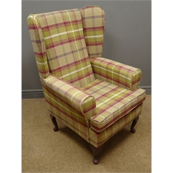  Wing back armchair upholstered in a checkered fabric  