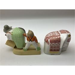 Late 19th/early 20th century German bisque comical novelty vesta holder and striker, the base inscribed 'My Word if I Catch you Bending', with impressed marks beneath (a/f), L12cm, together with Nao figure of a jester, other figures to include Mlesna elephant tea caddy