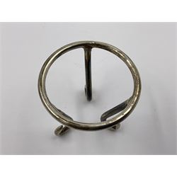 Modern silver limited edition Easter egg, no. 70/500, the gilt openwork body decorated with cascading bluebells and hinged cover with pierced circular panel set with a single faceted purple stone, opening to reveal a gilt interior, upon silver stand with three scrolling pad feet, each hallmarked St James House Company, London 1981, height including stand 8cm