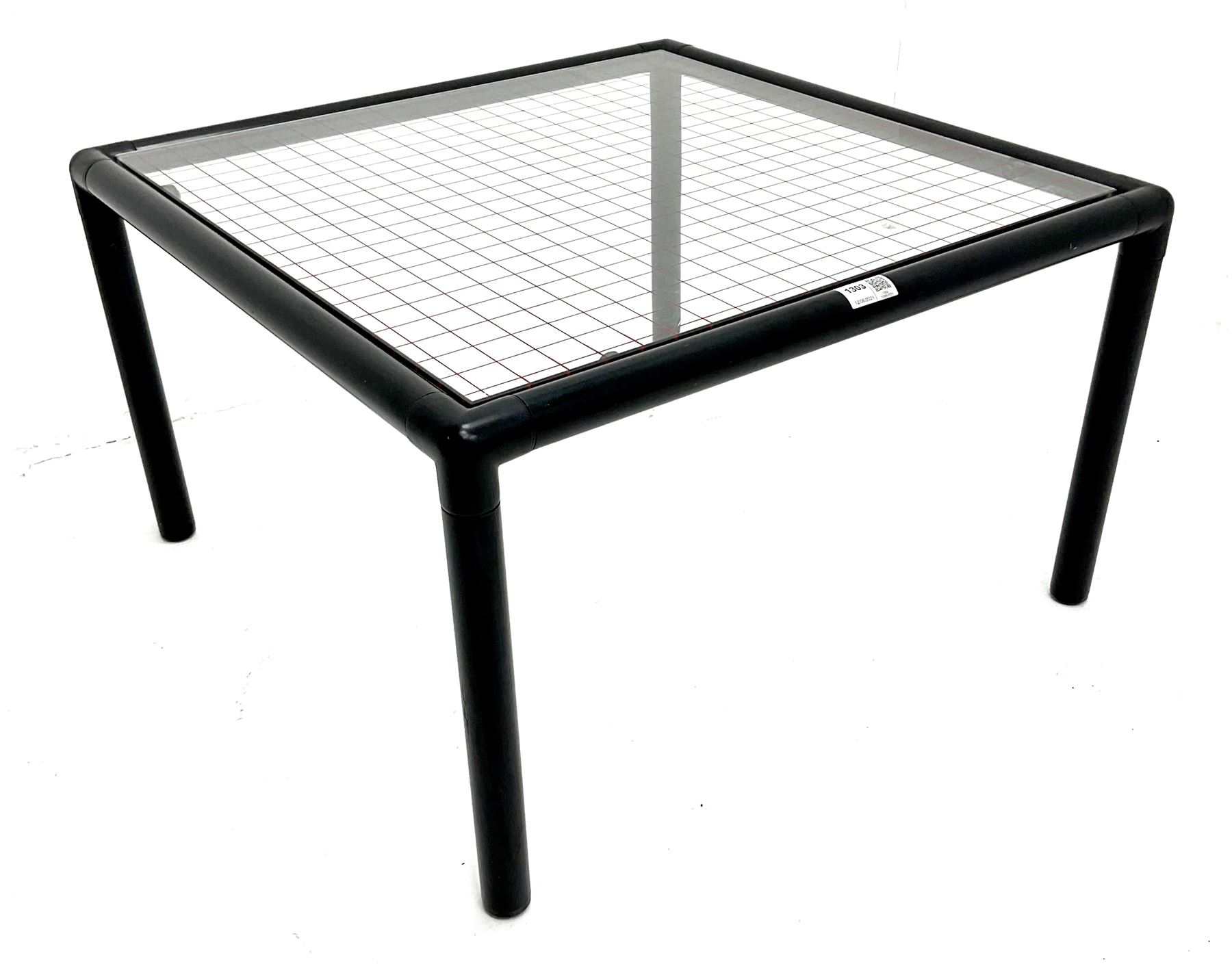 Habitat - tubular steel coffee table, inset glass top with red line grid