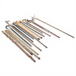 Collection of modern walking sticks, ebonised evening canes, thumb stick and shooting stick etc 