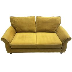 Next Furniture - traditional shaped three-seat sofa, upholstered in mustard velvet, rolled arms with pipping, on turned front feet
