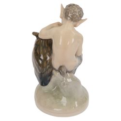 Three Royal Copenhagen figures, comprising Faun and Frog no. 1713,  Fawn and Owl no. 2107 and Faun with a Raven no.2113