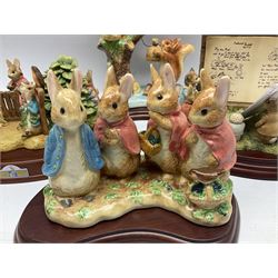 Four Border Fine Arts Beatrix Potter figures, comprising Tableau created to commemorate the Millenium together with a Border Fine Arts Limited Edition no 669814, The Tale of Peter Rabbit Tablet A1306, Four Little Rabbits A2442 and Sailing Home A2443