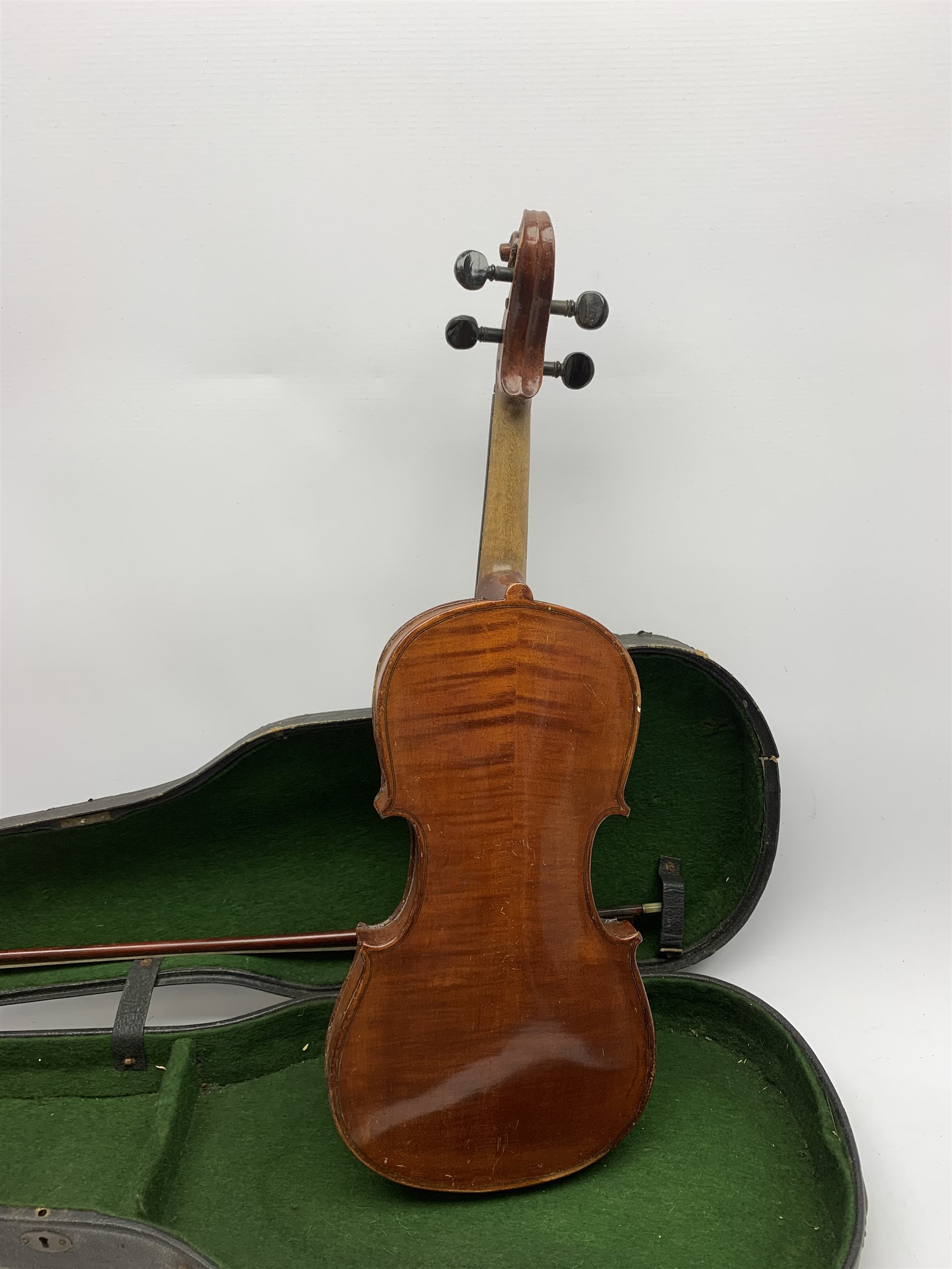 An early 20th century violin, The Maidstone, Murdoch & Co, London, with one piece maple back and spruce top, 60cm long, with bow, and ebonised coffin shaped case. 