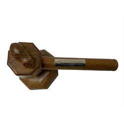 Mouseman - oak gavel and block, the octagonal head with carved mouse signature, the block of octagonal stepped form with baize lined underside, by the workshop of Robert Thompson, Kilburn, L17.5cm