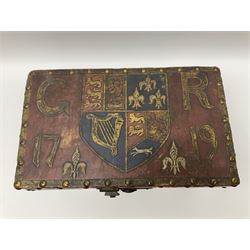 20th century box, decorated in faux leather with the royal coat of arms and GR 1719 to hinged cover, with fleur-de-lis, lion, crown and rose motifs throughout and studs to all edges, opening to reveal a purple velvet interior containing three removable wooden trays, H18.5cm