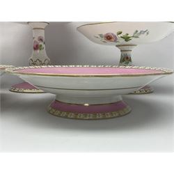 Victorian Copeland, Botanical dessert service, decorated with floral sprigs to the centre with a pink and gilt border, comprising five comports and seven plates, largest comport H20cm, plate D22cm