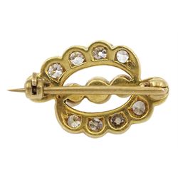 Early 20th century 18ct gold and palladium ten stone diamond and three stone pearl cross over brooch