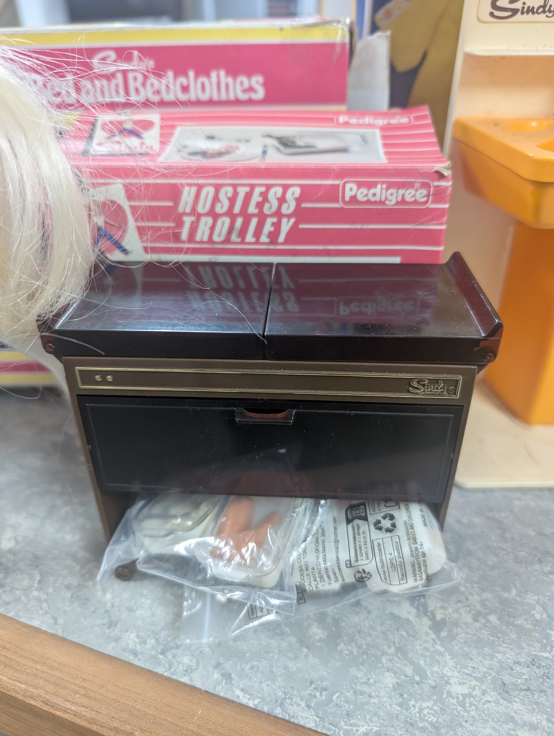 Pedigree Sindy's House and furniture, including shower, kitchen unit, washbasin, china cabinet and bed, all boxed, together with Barbie doll and horse