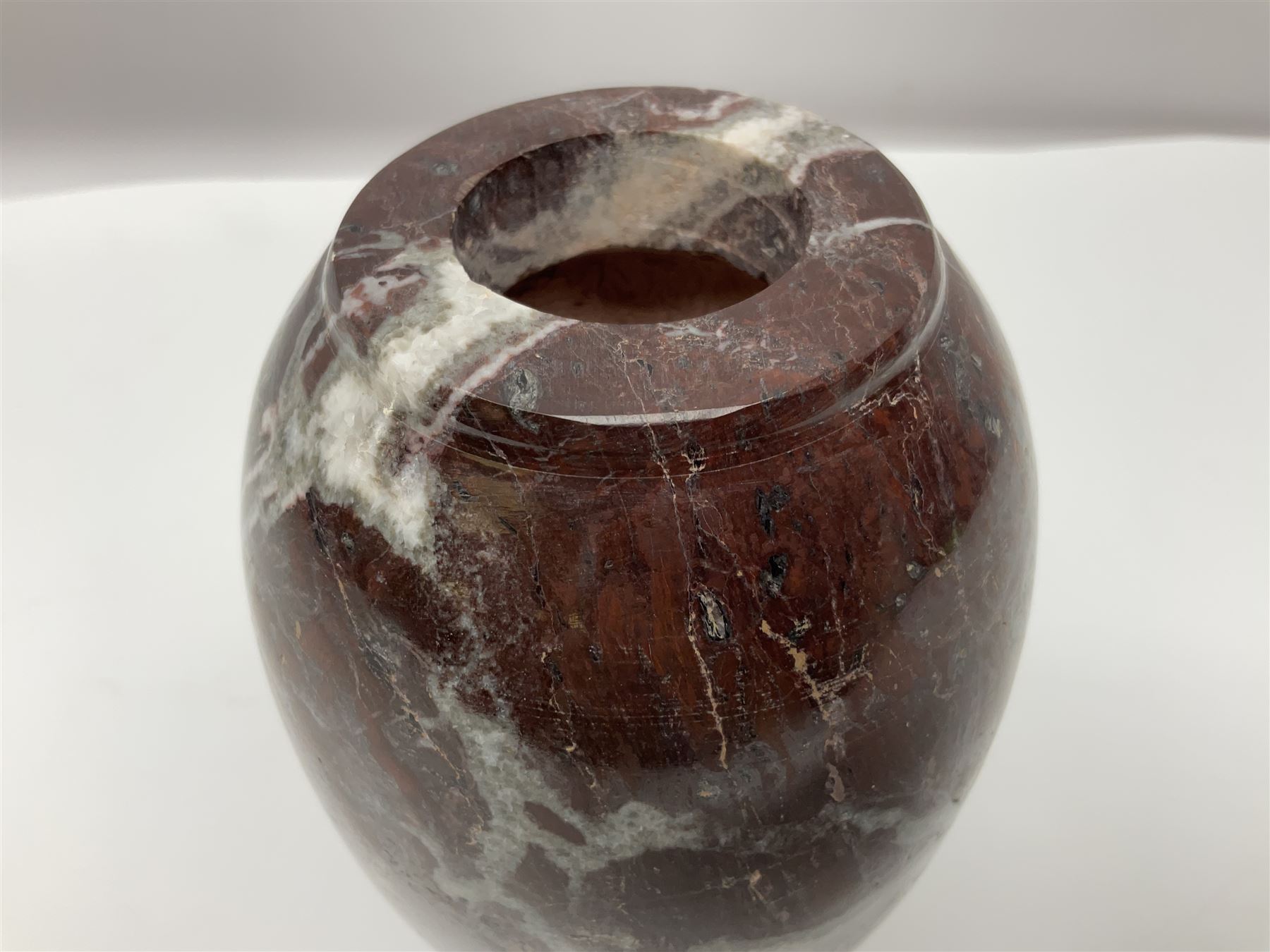 Red marble vase, of baluster form, H18cm
