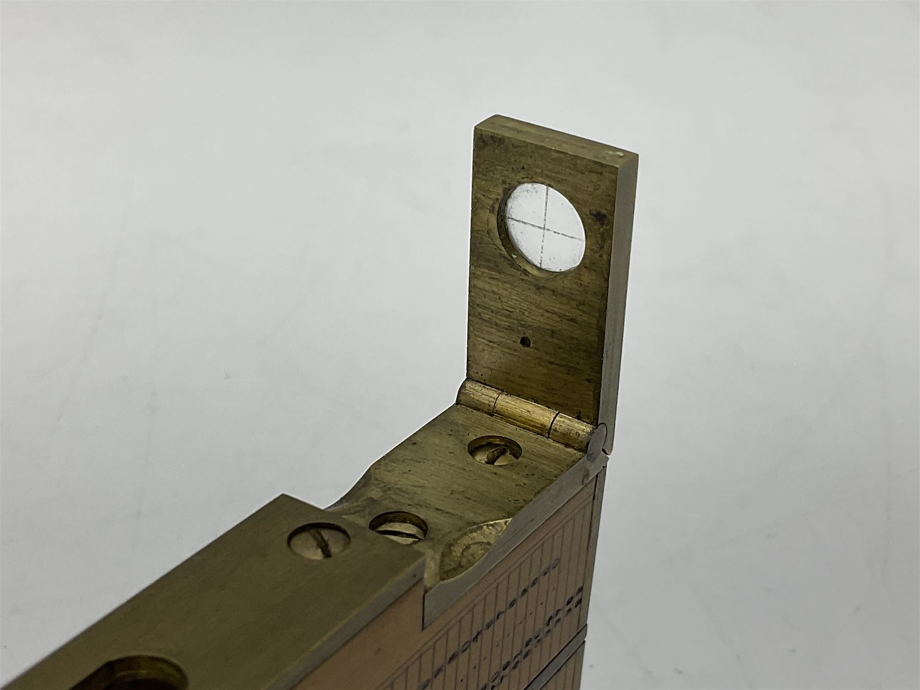 Late 19th/early 20th century boxwood and brass clinometer rule by Stanley, with inset magnetic compass, screw action protractor hinge divided to one degree with rise in inches per yard scale under, spirit level to one edge, marked 'W.F. Stanley Great Turnstile Holborn' with tables of distances, angles and thickness H16cm closed: in original leather covered case with instructions