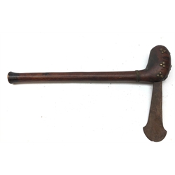 Late 19th century African tribal short axe, the brass studded bulbous head inset with an iron axe blade, with plaited yellow metal band around the hardwood shaft L44cm
