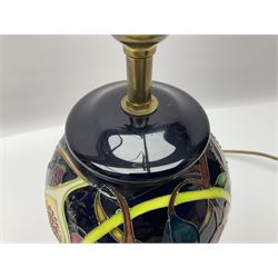 Moorcroft table lamp of baluster form, decorated in the Queens Choice pattern by Emma Bossons, H49cm
