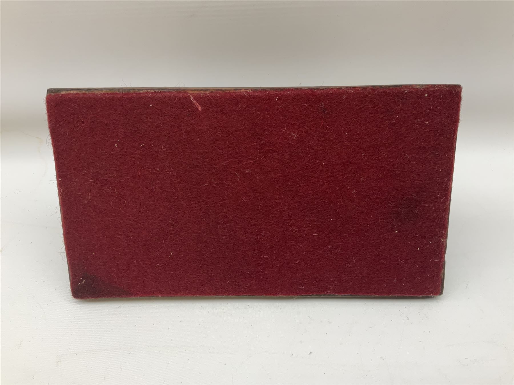 Early 19th century flintlock 16-bore overcoat/duelling pistol by William Bond Lombard Street London, the 23cm octagonal brown stub twist damascus barrel with small foresight, two barrel pins and ram rod under, inscribed Lombard Street London to the top and W. Bond to the action, full walnut stock with lightly engraved steel furniture, pineapple finial and escutcheon, half cock facility L39cm; loose mounted on later mahogany display stand with trade label