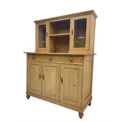 Early 20th century French pine side cabinet or dresser, fitted with two glazed cupboards flanking central shelf, over three drawers and three cupboards