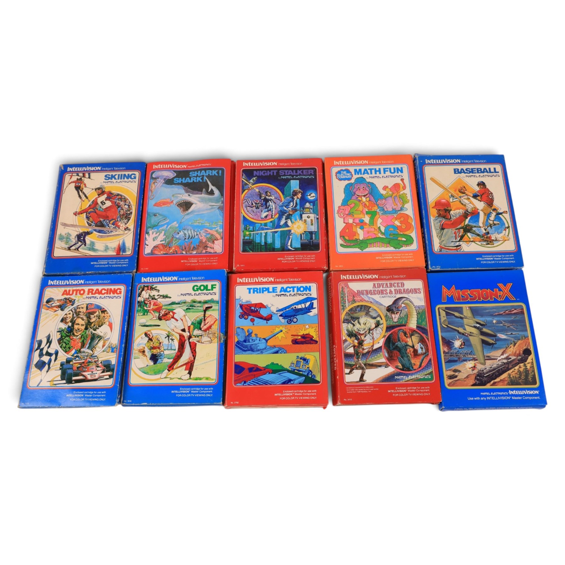 Mattel Electronics Intellivision Intelligent Television Master Component and twenty boxed games comprising Golf, Soccer, Lock N Chase, Reversi, Night Stalker, Math Fun, Baseball, Shark! Shark!, Skiing, Tutankham, Frogger, Popeye, Advanced Dungeons & Dragons, Draughts, Triple Action, Frog Bog, Mission-X, Space Battle, Bowling and Auto Racing 
