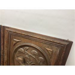 Pair of oak furniture door panels, carved in relief with a fox to one and a hound to the other, together with a pair of smaller oak panels, carved in relief with a hare to one and a grouse to the other, doors W63.cm x H62cm, panels W43cm x H60cm