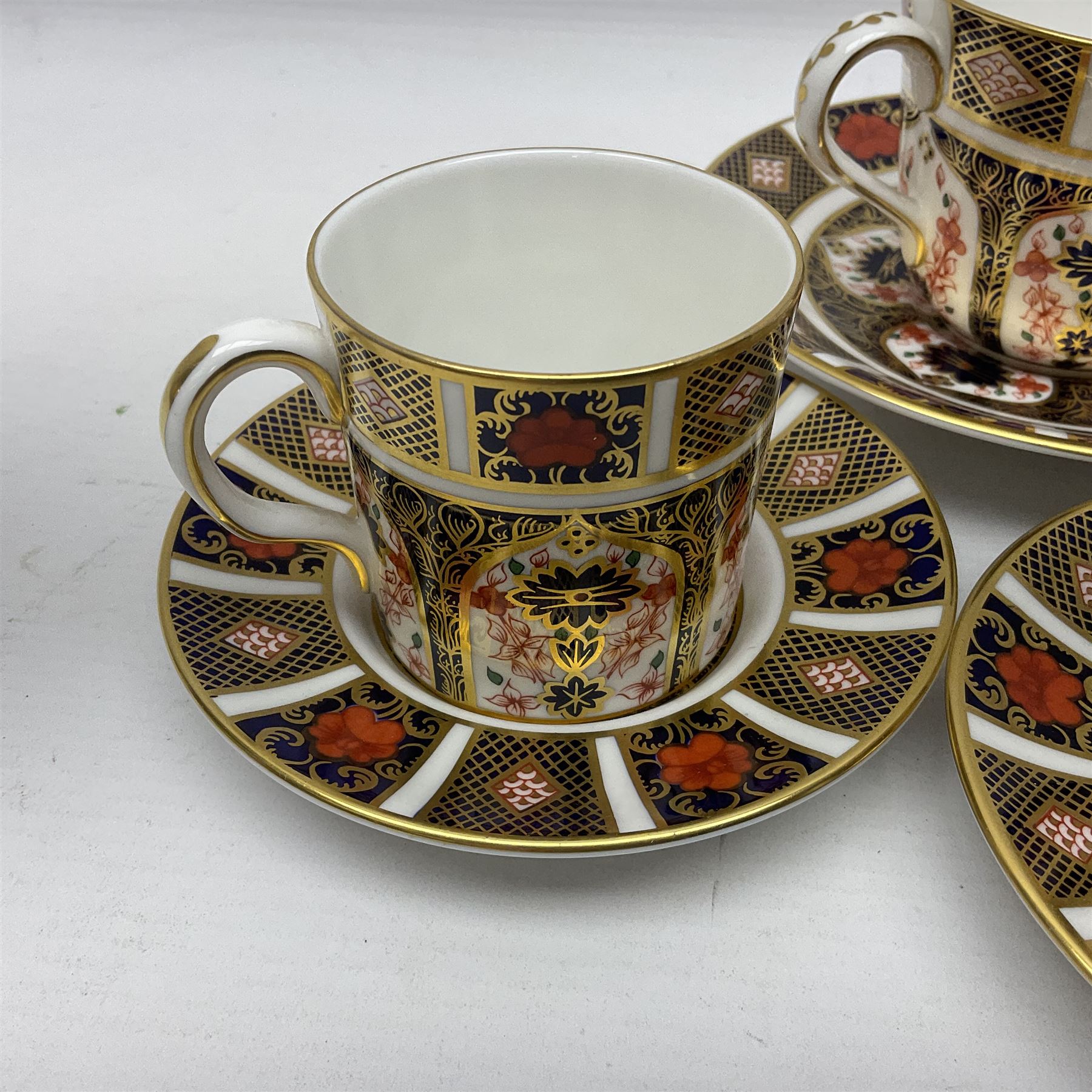 Royal Crown Derby 1128 Imari pattern two coffee cans and saucers