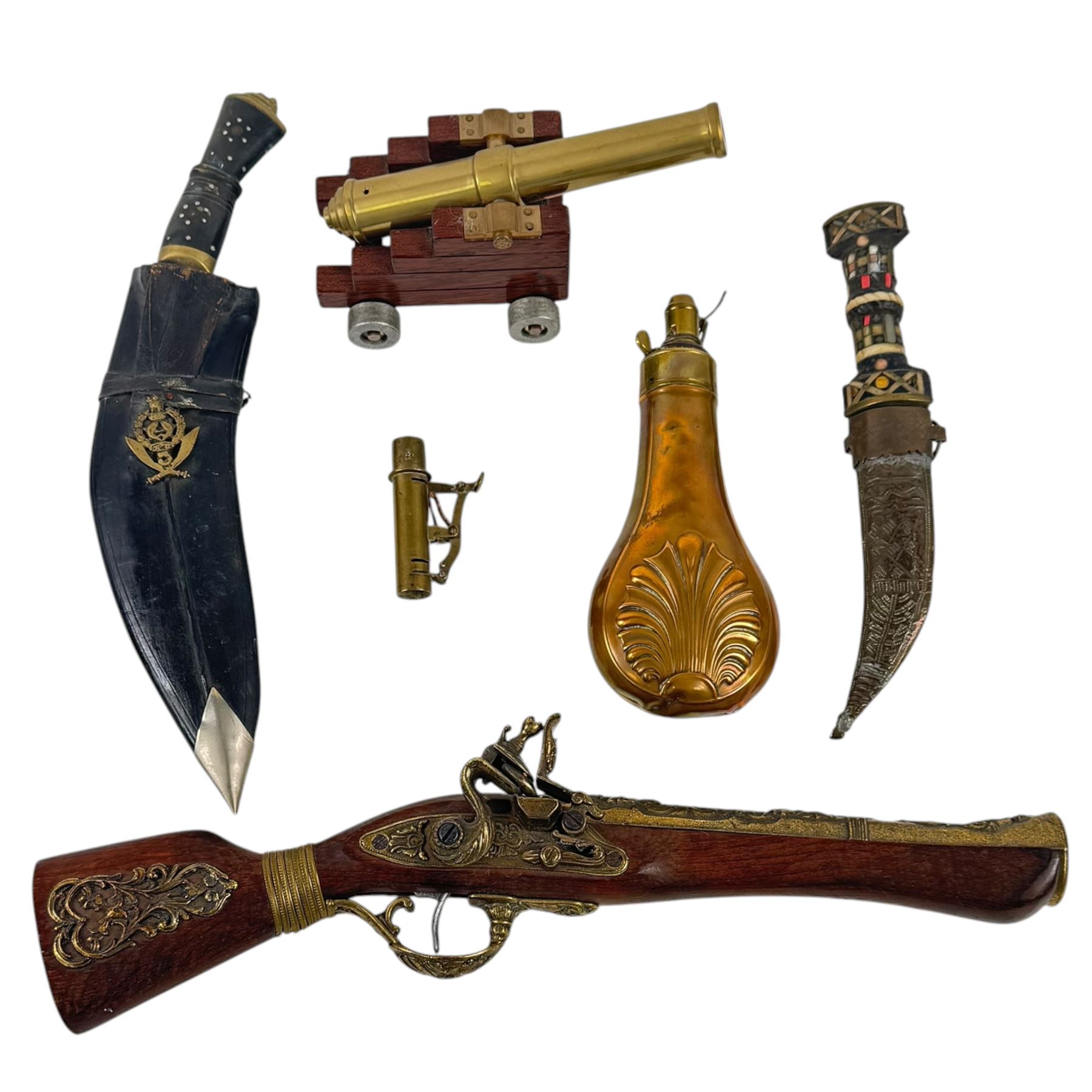 Model cannon, together with Kukri, copper power flask etc 