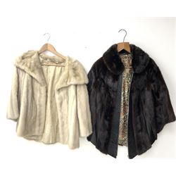 A ladies short brown mink fur coat, with leather trim, together with a further ladies short blonde mink fur coat. (2).