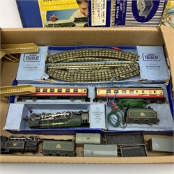 Hornby Dublo - electric three-rail train set with Duchess Class 4-6-2 locomotive 'Duchess of Montrose' No.46232 with tender and two passenger coaches, boxed; Class N2 0-6-2 tank locomotive No.69567, five goods wagons and level crossing etc, all unboxed; boxed controller and booklet