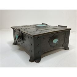 Arts and Crafts copper box, the lid decorated with stylised riveted hinges and inset with Ruskin type ceramic turquoise heart-shaped cabochon, the mount etched M.B 1913, and further cabochon roundel to each side panel, including one inset to the clasp acting as the knob to the locking mechanism, marked RS Douglas 1913 beneath, W16.5cm H7cm D15cm