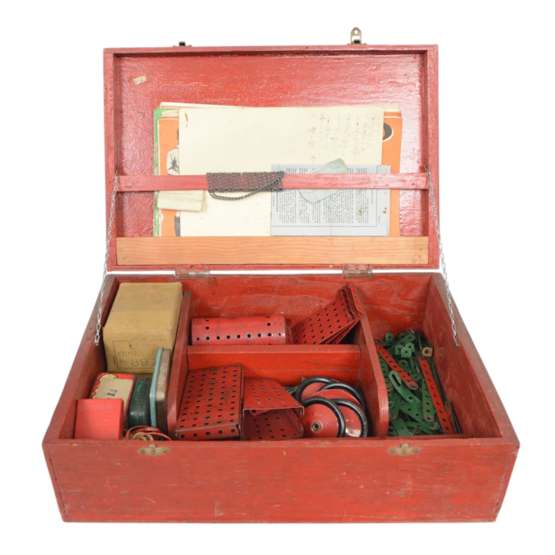 Mid 20th century Meccano outfit, including perforated strips, wheels, angled plate, boiler, flanged plates, no. 1 clockwork motor, etc, contained within red wooden box, with hand painted lettering to the cover reading 'No.7 Meccano B.H'
