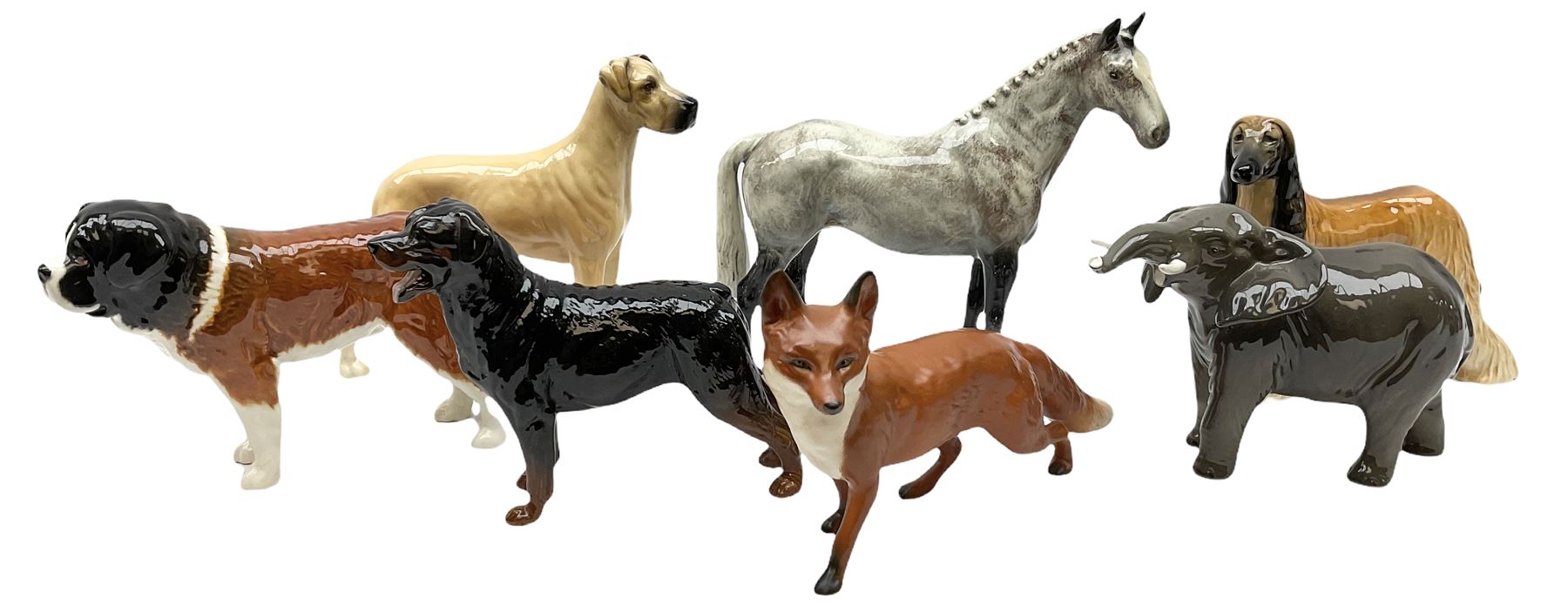 Beswick figures, comprising Afghan Hound 2285, St Bernard 'Corna Garth Stroller' 2221, Rottweiler 3056, Greatdane 'CH Ruler of Ouborough', Fox, Elephant, and dappled grey type horse. 