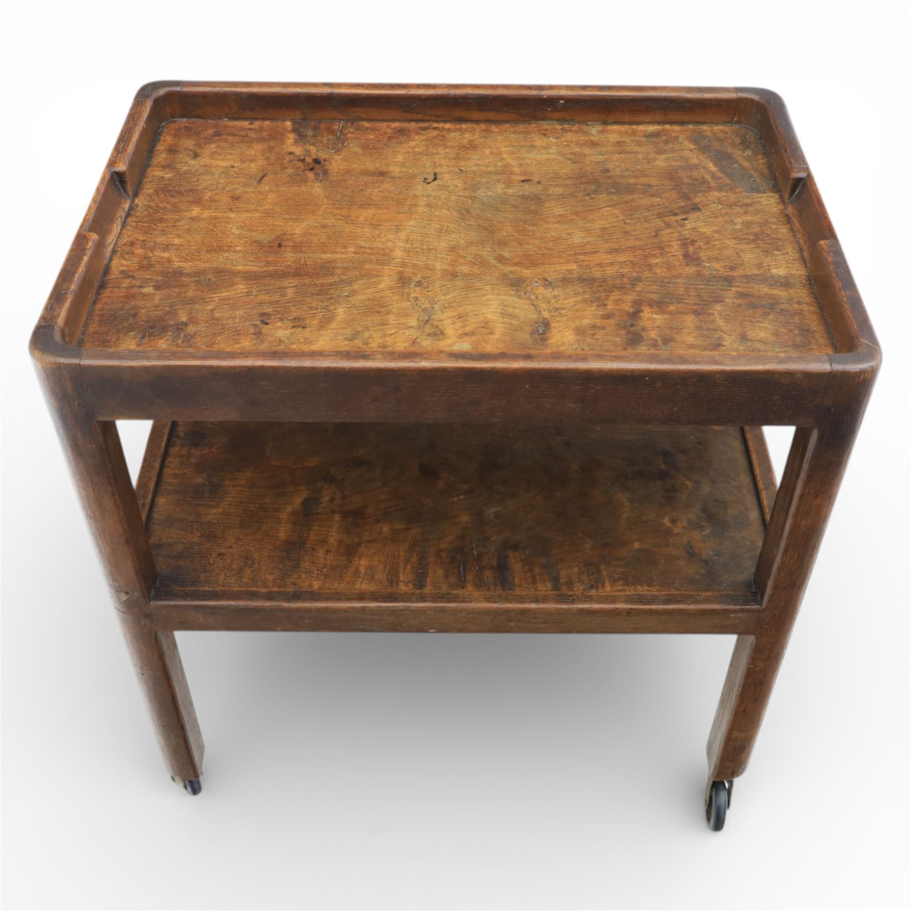 Yorkshire oak dark stained tea trolley, adzed two tier table, raised on castors