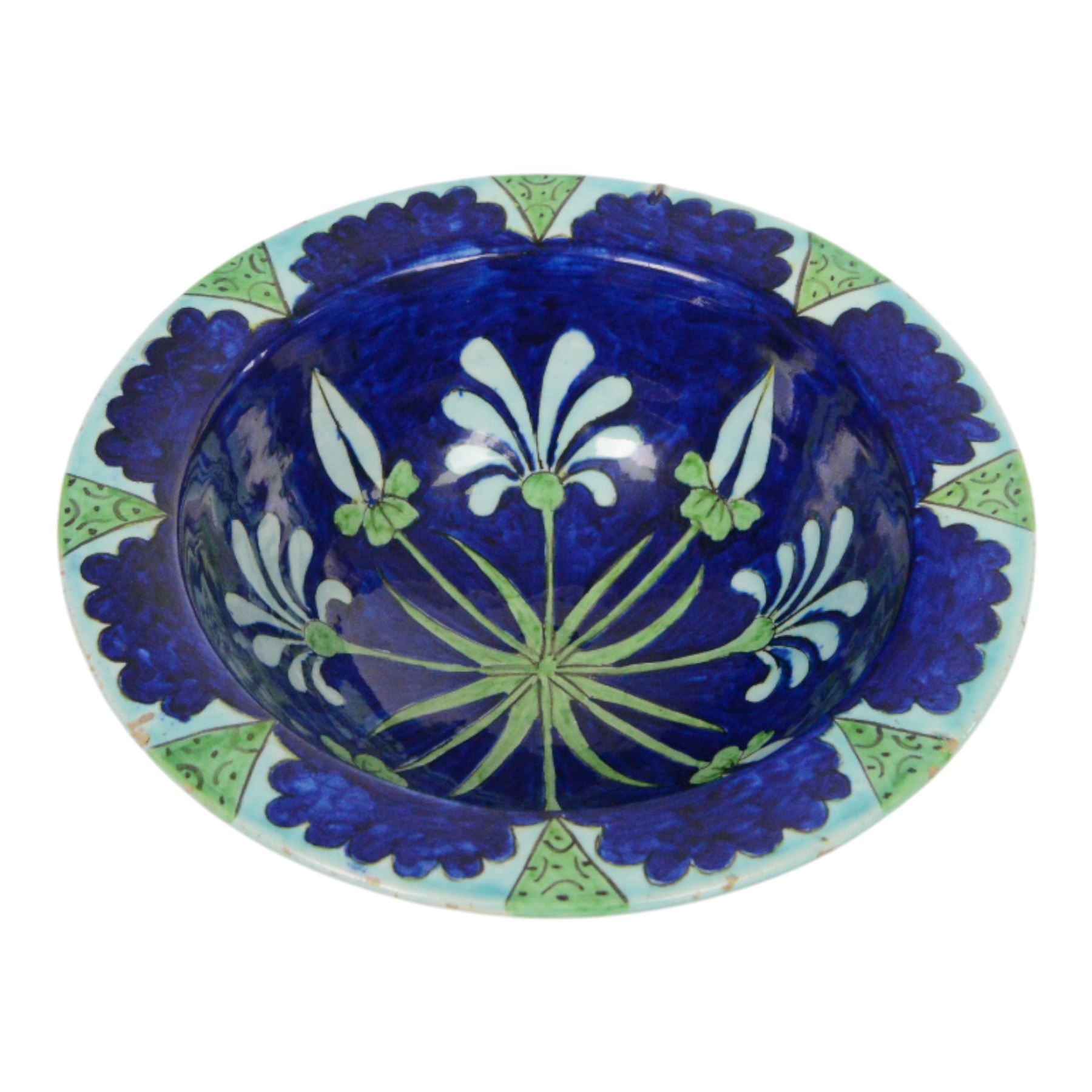 After Torquato Castellani, tin-glazed earthenware bowl, with a floral design the the centre, marked beneath, D19cm 