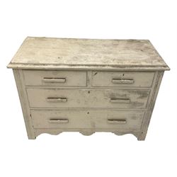 20th century painted pine chest of drawers, rectangular top over two short and two long drawers, scalloped apron, on castors