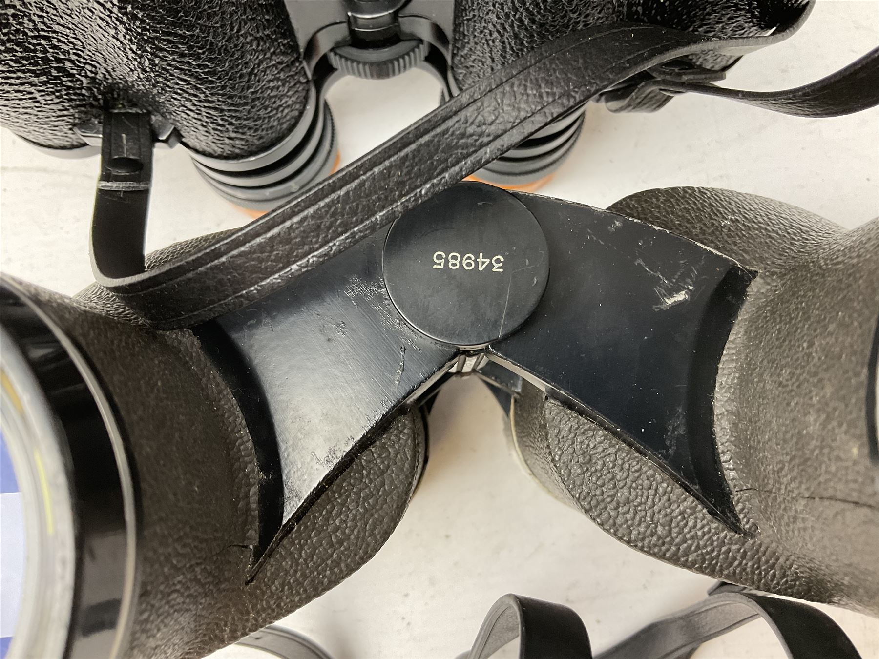 Twelve pairs of binoculars to include BWCF 7x35 Extra Wide Angle, Carl Zeiss Jena Delturis 8x24, Carl Zeiss Jena Jenoptem 8x30W, Chinon Countryman 10x50,  Ajax 8x30, Regent 16x50, etc,  some with cases