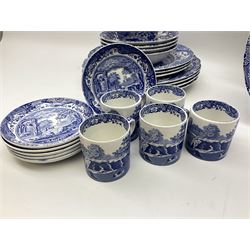 Spode blue and white Italian pattern dinner and tea wares, comprising five dinner plates, four side plates, seventeen side plates, four bowls, ten tea cups and twenty one saucers, five coffee cans and six saucers, and a flan dish, with blue and black printed marks beneath 