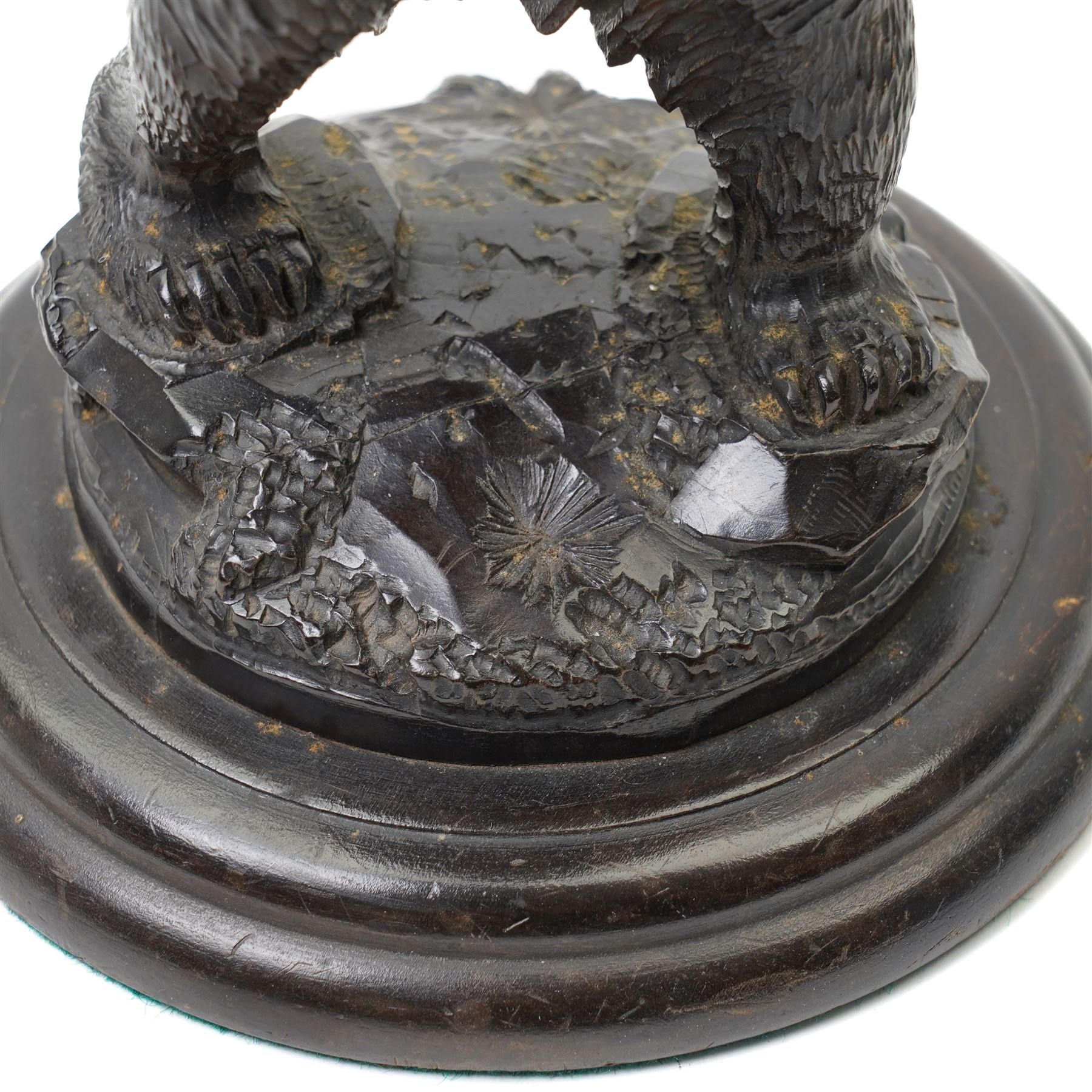 Black forest carving of a circus bear, holding aloft a ball, standing, H35cm