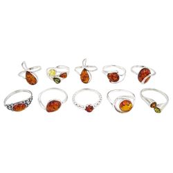 Ten silver amber rings, all stamped 925