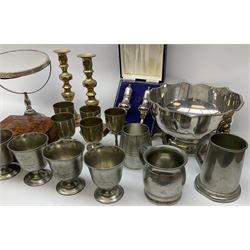 Group of metalware, to include silver plated bowl with lion mask ring handles, cased set of silver plated cruets, pair of brass knopped candlesticks, set of four Continental pewter goblets, marked beneath Sn 95% GT, etc. 