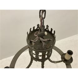 Gothic style iron chandelier with drip pans and twisted branches together with three matching twin wall sconces