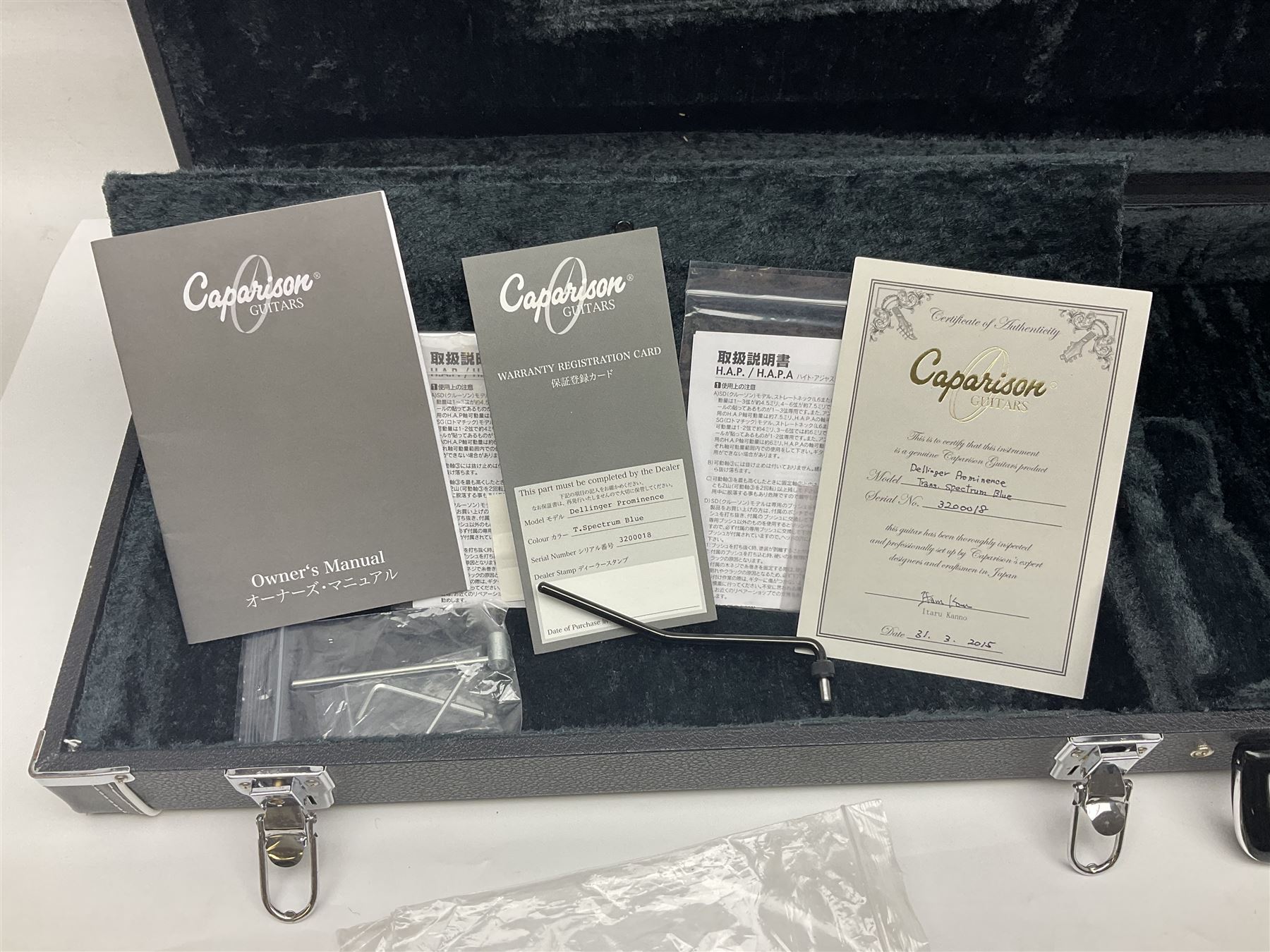 2015 Japanese Caparison Dellinger Prominence hand made boutique rock guitar in spectrum blue with clock inlays and Scaller tremolo; serial no.3200018; L100cm; in fitted case with certificate, registration card, tools etc